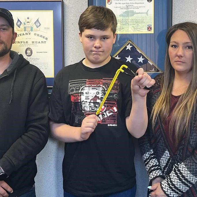 Michigan boy who used slingshot to save sister says he 'was just lucky'
